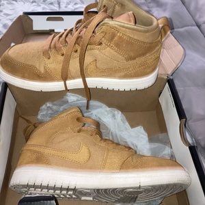 Brown Nike shoes